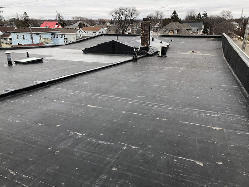 Wisconsin Roofing LLC | Fond Du Lac | Commercial Roofs | EPDM Rubber Tapered Insulation Custom Drains