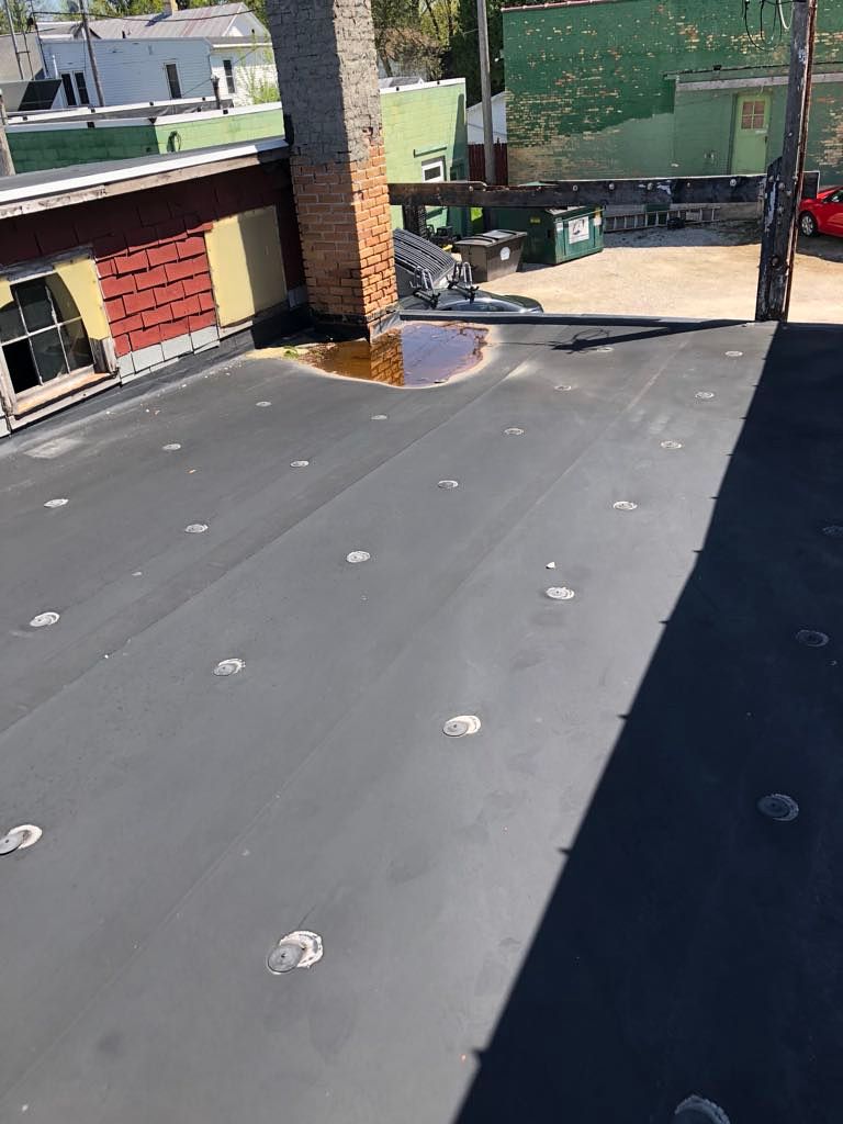 Wisconsin Roofing LLC | Case Study | Hugh Lomas | Low Slop Roof | Before Job