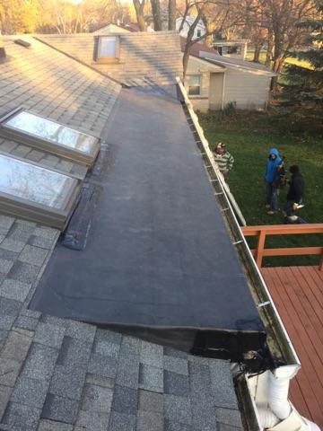 Wisconsin Roofing LLC | Flat Decks | Residential | Side View Gutters