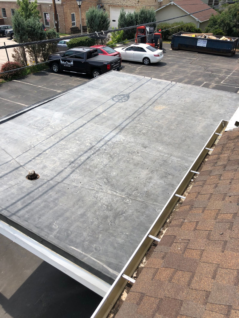 Wisconsin Roofing LLC | Flat Decks | Residential | Water Drain