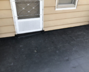 Wisconsin Roofing LLC | Flat Decks | Residential | Entry Door