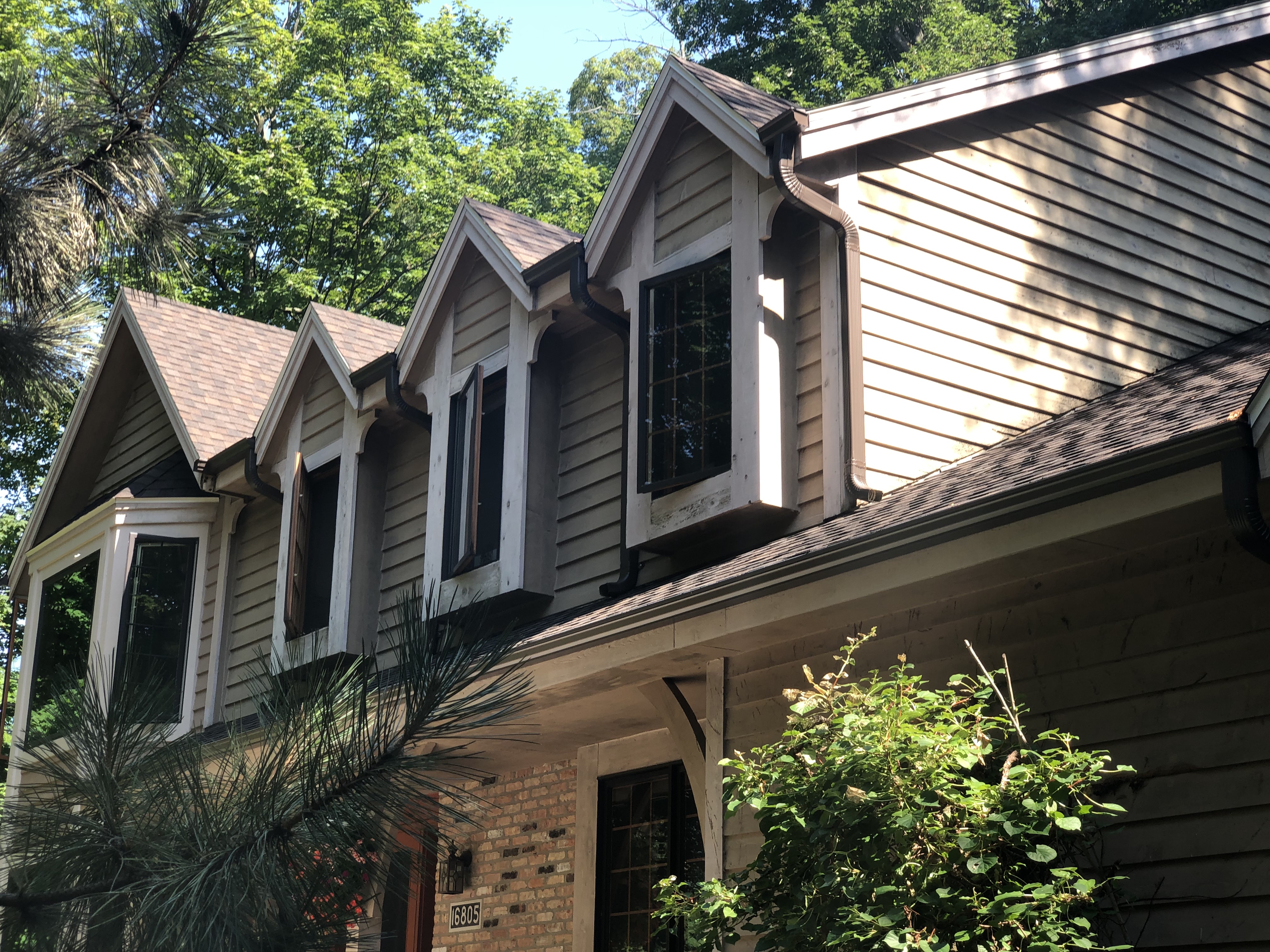 Wisconsin Roofing LLC | Brookfield | Upgraded CertainTeed Landmark PRO Shingles | Burnt Sienna | New gutters | New RAINDROP Leaf Protection | Extensive Landscaping