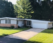 Wisconsin Roofing LLC | Menomonee Falls | Residential | New Rubber Flat Roof | was leaking and had poor detail work prior to upgrading their exhaust for kitchen and bathroom ventilation front view