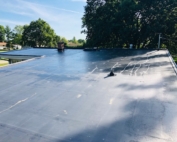 Wisconsin Roofing LLC | Menomonee Falls | Residential | New Rubber Flat Roof | was leaking and had poor detail work prior to upgrading their exhaust for kitchen and bathroom ventilation roof view