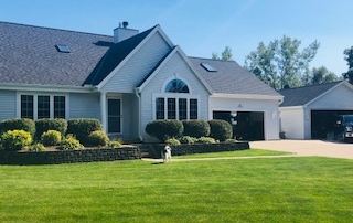 Wisconsin Roofing LLC | Pewaukee | Residential | Landmark Pro Moire Black | Finished