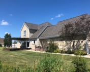 Wisconsin Roofing LLC | Belgium | Residential | Landmark Weathered Wood | Very large difficult roof with lots of transitions | garage