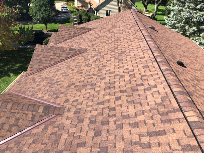 Wisconsin Roofing LLC | Brookfield | Upgraded Ventilation Unblocked Soffit Vents | Baffled Intake Chutes | CertainTeed Landmark Burnt Sienna Shingles | Ridge