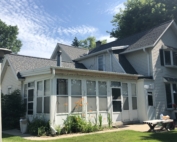 Wisconsin Roofing LLC | Germantown | Residential | New Roof | Added intake and exhaust ventilation difficult farm house | custom transitions | Prior rubber roof done poorly that leaked | Re-framed perimeter