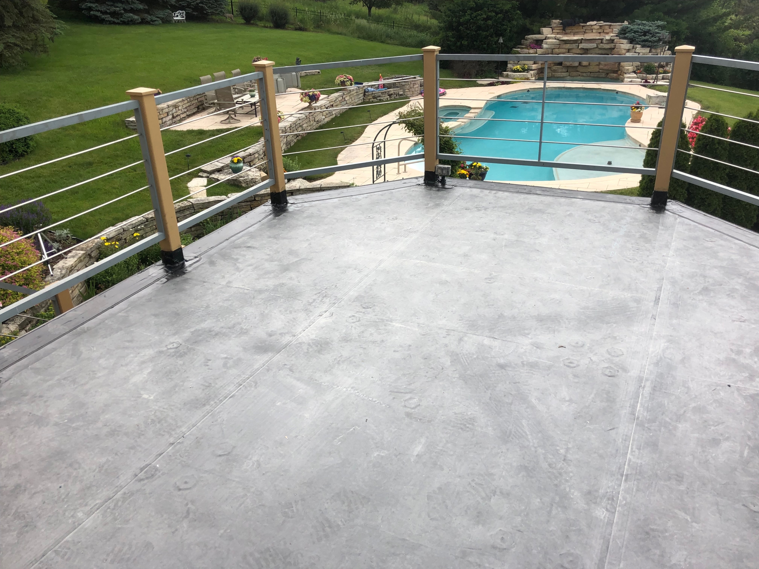 Wisconsin Roofing LLC | Best Work | Flat Deck | Backyard | Waukesha