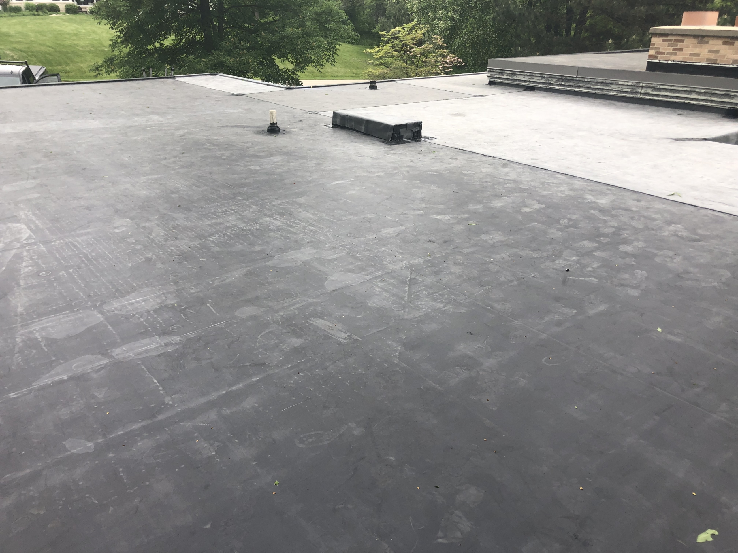 Wisconsin Roofing LLC | Flat Deck | Cleanup | Brookfield