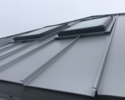 Wisconsin Roofing LLC | Residential | Elkhart Lake | Metal roof and side view of skylights