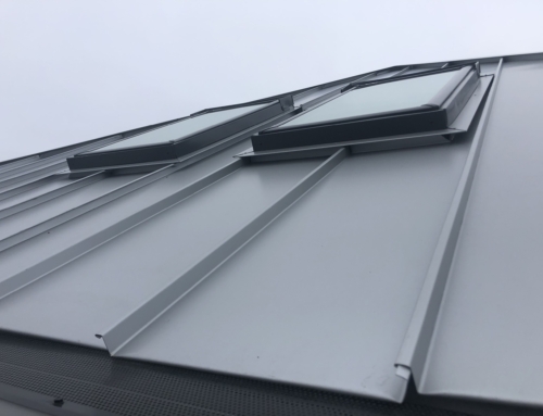 Wisconsin Roofing LLC | Residential | Elkhart Lake | Metal roof and side view of skylights