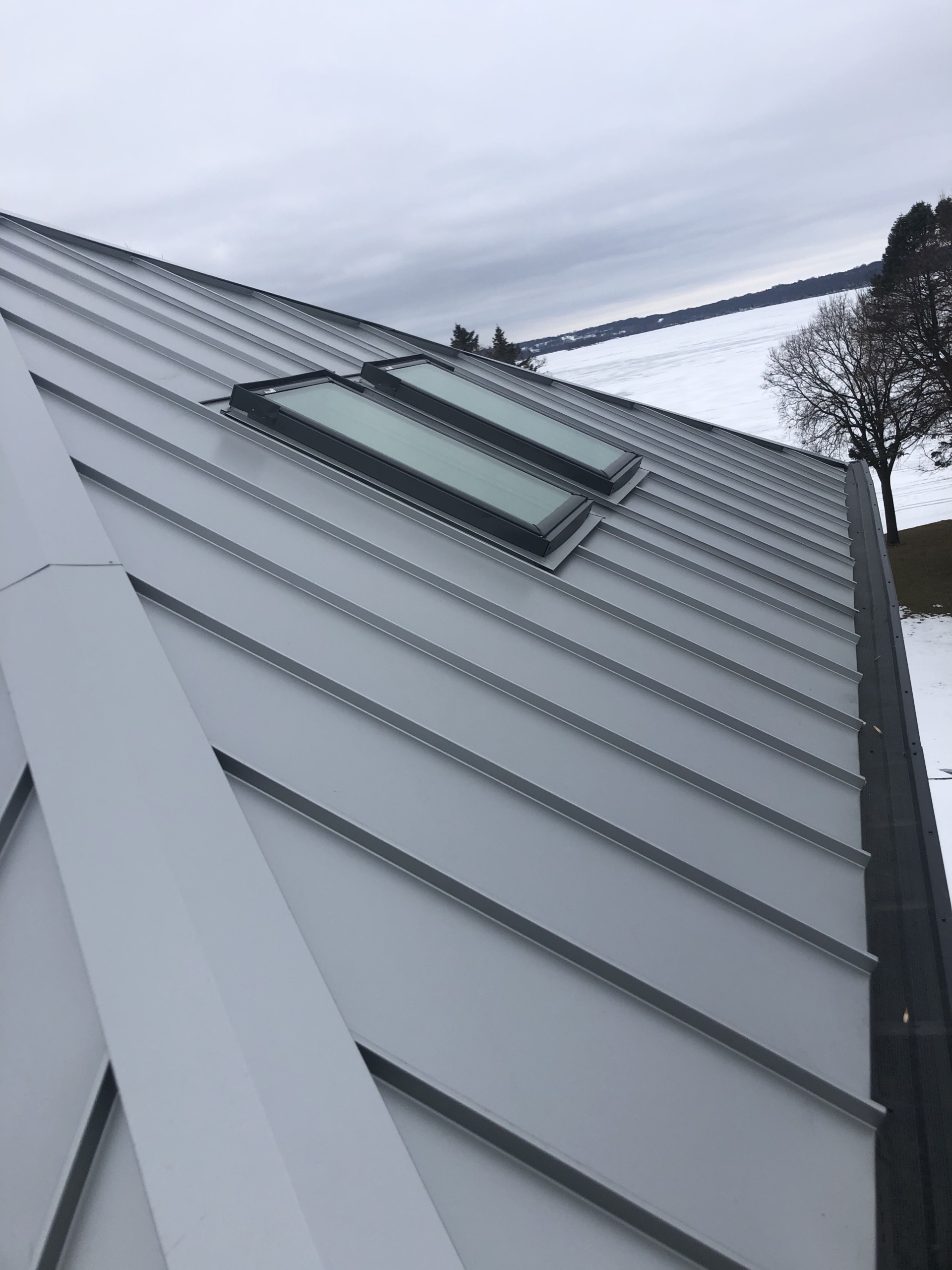Wisconsin Roofing LLC | Residential | Elkhart Lake | Metal roof and skylights