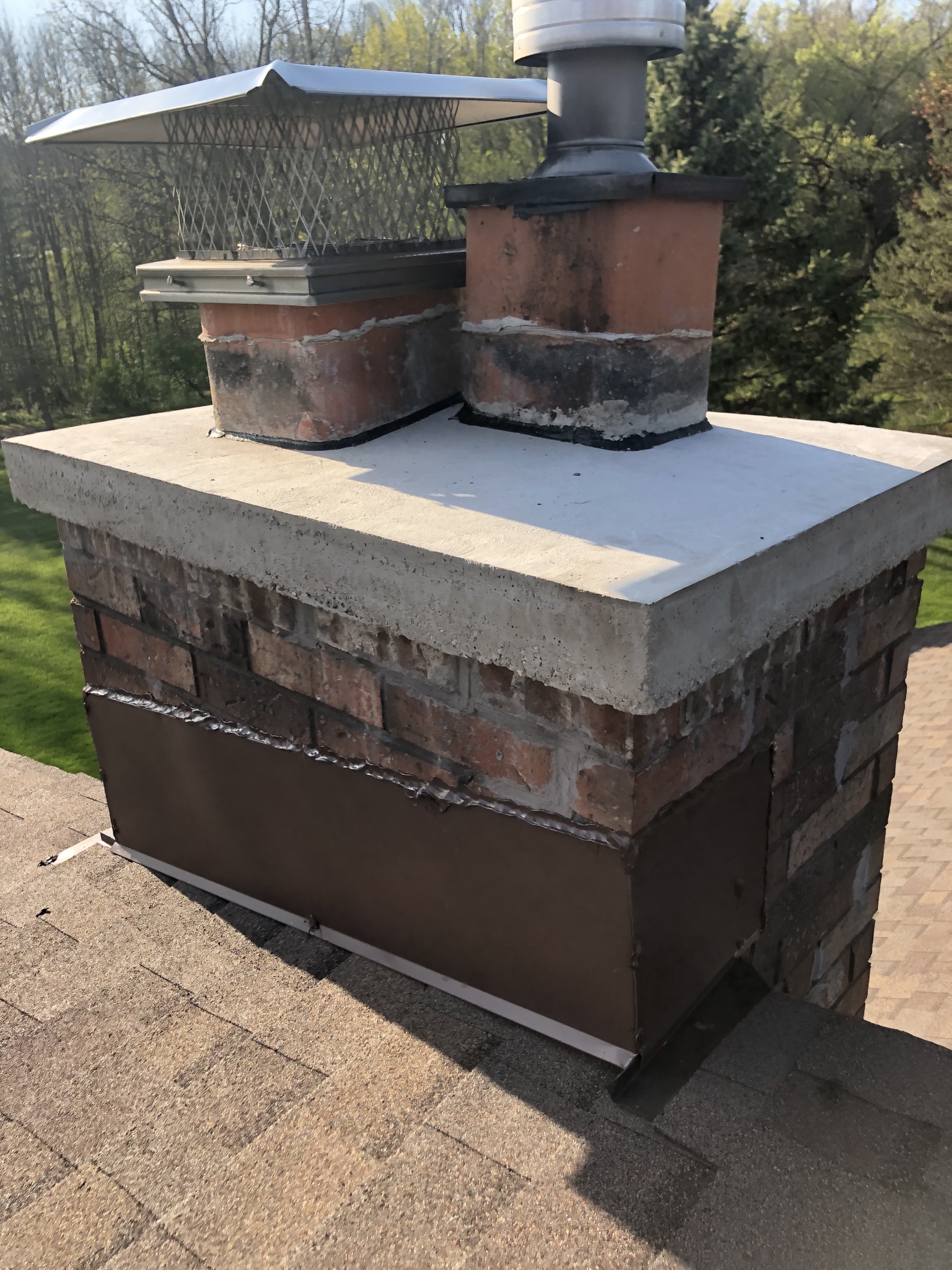 Wisconsin Roofing LLC | Residential | Kohler | Custom chimney diverter flashing